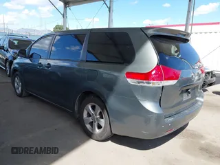 2014 Toyota Sienna L with VIN 5TDZK3DC6ES441417, listed as a IAAI auction lot 41950033 with 170,804 mi miles. Bid and sale history available at carsss.com. Image 3.