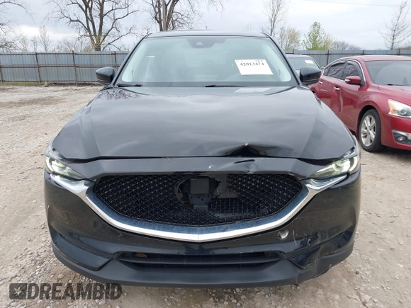 2018 Mazda CX-5 Grand Touring with VIN JM3KFBDM3J0384431, listed as a IAAI auction lot 42013474 with 65,018 mi miles. Bid and sale history available at carsss.com. Image 12.