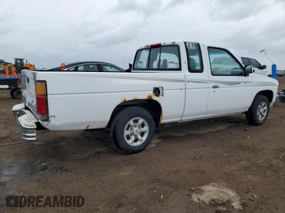 1997 Nissan Frontier XE with VIN 1N6SD16S8VC426940, listed as a Copart auction lot 55860235 with 242,265 mi miles and Salvage title. Bid and sale history available at DreamBid. Image 3.
