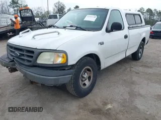2003 Ford F-150 XL with VIN 1FTRF17243NB84790, listed as a IAAI auction lot 41955730 with Not provided miles and . Bid and sale history available at DreamBid. Image 2.