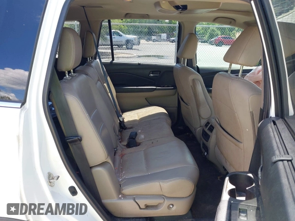 2019 Honda Pilot EX-L with VIN 5FNYF5H42KB026108, listed as a IAAI auction lot 42387593 with 112,556 mi miles and . Bid and sale history available at DreamBid. Image 8.