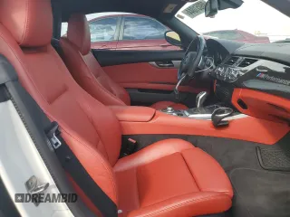 2012 BMW Z4 sDrive35i with VIN WBALM7C55CE385061, listed as a Copart auction lot 48051044 with 87,369 mi miles and Salvage Title. Bid and sale history available at carsss.com. Image 10.
