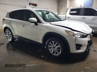 2016 Mazda CX-5 Touring with VIN JM3KE2CY7G0666474, listed as a Copart auction lot 45502575 with 162,881 mi miles and Salvage Title. Bid and sale history available at carsss.com. Image 4.