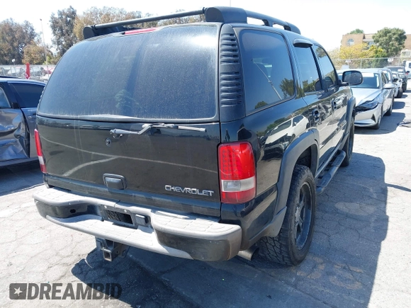 2001 Chevrolet Tahoe LT with VIN 1GNEK13T81R202598, listed as a IAAI auction lot 42007381 with 188,172 mi miles. Bid and sale history available at carsss.com. Image 4.