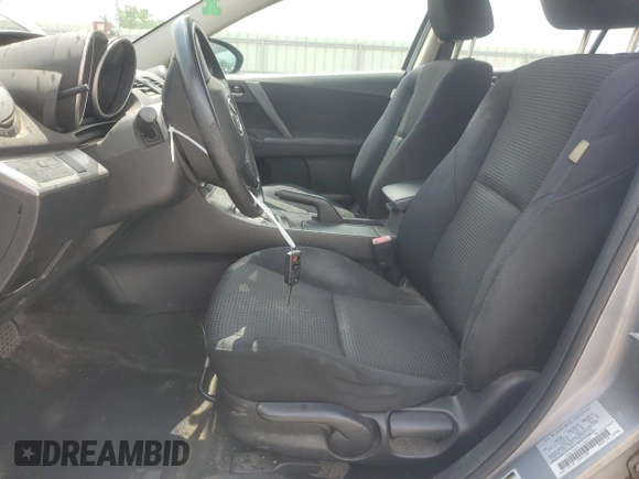 2012 Mazda 3 i Sport with VIN JM1BL1UG9C1518619, listed as a Copart auction lot 59777085 with 148,341 mi miles and Clean title. Bid and sale history available at DreamBid. Image 7.