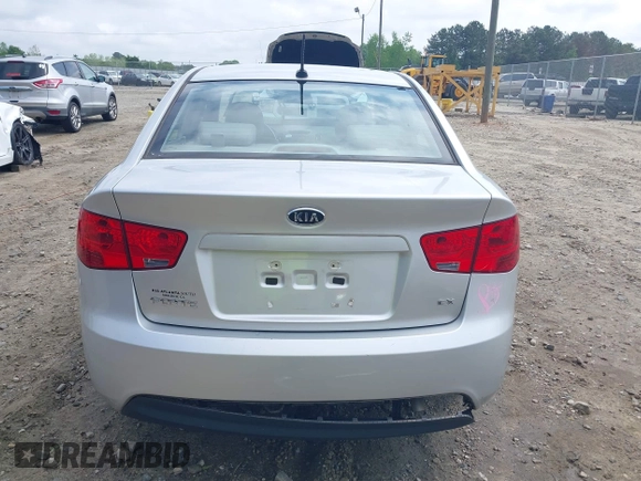 2010 Kia Forte EX z VIN KNAFU4A27A5834628, wystawiony jako IAAI lot #42123726 z przebiegiem 89 402 mil mil oraz . Historia ofert i sprzedaży dostępna na DreamBid. Obrazek 17.