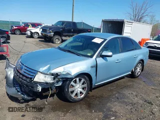 2008 Ford Taurus SEL with VIN 1FAHP24WX8G186437, listed as a IAAI auction lot 41934754 with 186,347 mi miles. Bid and sale history available at carsss.com. Image 2.