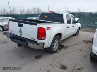 2012 GMC Sierra 1500 SLE with VIN 3GTP2VE7XCG124143, listed as a IAAI auction lot 41806110 with 118,145 mi miles. Bid and sale history available at carsss.com. Image 4.