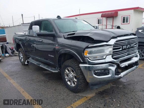 2022 Ram 2500 Laramie z VIN 3C6UR5FL2NG243857, wystawiony jako IAAI lot #41736144 z przebiegiem 58 474 mil mil oraz . Historia ofert i sprzedaży dostępna na DreamBid. Obrazek 1.