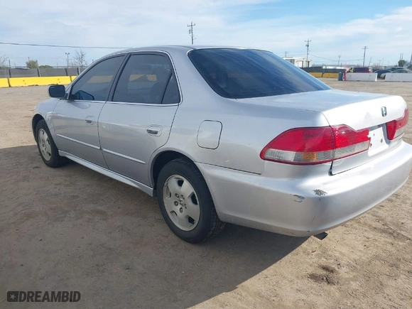 2001 Honda Accord Sdn EX w/Leather with VIN 1HGCG16511A007490, listed as a IAAI auction lot 41632731 with 140339 miles. Bid and sale history available at carsss.com. Image 3.