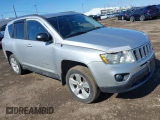 2012 Jeep Compass Sport with VIN 1C4NJDBB0CD590268, listed as a IAAI auction lot 41856474 with 148,627 mi miles. Bid and sale history available at carsss.com. Image 1.