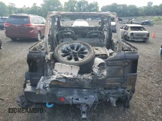 2023 Jeep Wrangler Sahara с VIN 1C4JJXP6XPW542086, выставлен на аукционе Copart как лот 64209345 с пробегом Не указан миль и Списание • Salvage title. История ставок и продаж доступна на DreamBid. Изображение 6.