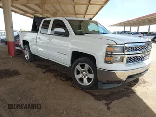 2015 Chevrolet Silverado 1500 LT with VIN 1GCVKREC1FZ415386, listed as a IAAI auction lot 42142990 with 165,409 mi miles and . Bid and sale history available at DreamBid. Image 1.