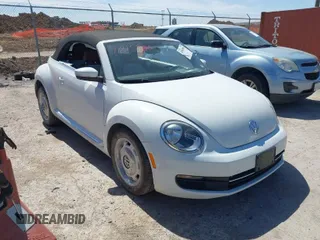 2015 Volkswagen Beetle 1.8T w/Tech with VIN 3VW517AT9FM810122, listed as a IAAI auction lot 41815980 with 72,420 mi miles and . Bid and sale history available at DreamBid. Image 1.