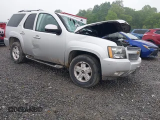 2011 Chevrolet Tahoe LT z VIN 1GNSKBE09BR352846, wystawiony jako IAAI lot #42340492 z przebiegiem 196 750 mil mil oraz . Historia ofert i sprzedaży dostępna na DreamBid. Obrazek 1.