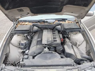 2003 BMW 5 Series 525iA with VIN WBADT43493G030122, listed as a IAAI auction lot 41889529 with 118,293 mi miles. Bid and sale history available at carsss.com. Image 10.