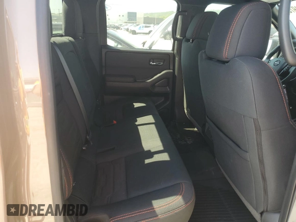 2023 Nissan Frontier Pro-4X with VIN 1N6ED1EK0PN668109, listed as a Copart auction lot 57064975 with 6,406 mi miles and Salvage title. Bid and sale history available at DreamBid. Image 10.