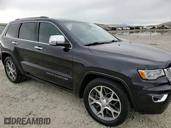2020 Jeep Grand Cherokee Overland with VIN 1C4RJFCG9LC264711, listed as a Copart auction lot 51505885 with 52,670 mi miles and Salvage Title. Bid and sale history available at DreamBid. Image 12.
