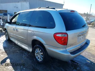 2003 Chrysler Town & Country EX with VIN 2C4GP74L83R212596, listed as a IAAI auction lot 41335410 with Not Provided miles and . Bid and sale history available at carsss.com. Image 3.