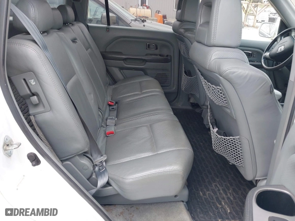 2004 Honda Pilot EX with VIN 2HKYF18604H559427, listed as a IAAI auction lot 42045954 with 361,939 mi miles. Bid and sale history available at carsss.com. Image 8.