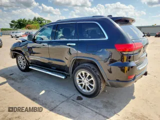 2014 Jeep Grand Cherokee Limited with VIN 1C4RJFBG9EC121990, listed as a Copart auction lot 64079495 with 98,615 mi miles and Salvage title. Bid and sale history available at DreamBid. Image 2.