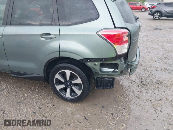 2018 Subaru Forester Premium with VIN JF2SJAEC5JH434174, listed as a IAAI auction lot 42106434 with 79,656 mi miles and . Bid and sale history available at DreamBid. Image 18.