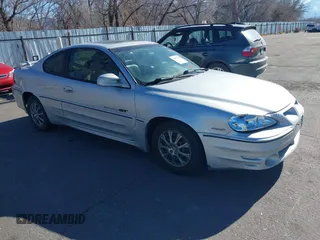 2001 Pontiac Grand Am z VIN 1G2NV12E81M600480, wystawiony jako IAAI lot #41493128 z przebiegiem 183 809 mil mil oraz . Historia ofert i sprzedaży dostępna na DreamBid. Obrazek 1.