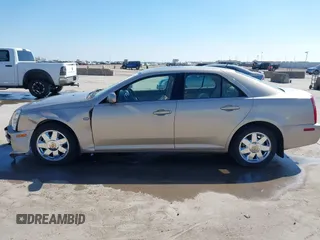 2005 Cadillac STS z VIN 1G6DC67A950171835, wystawiony jako IAAI lot #41599105 z przebiegiem 74 235 mil mil oraz . Historia ofert i sprzedaży dostępna na DreamBid. Obrazek 14.