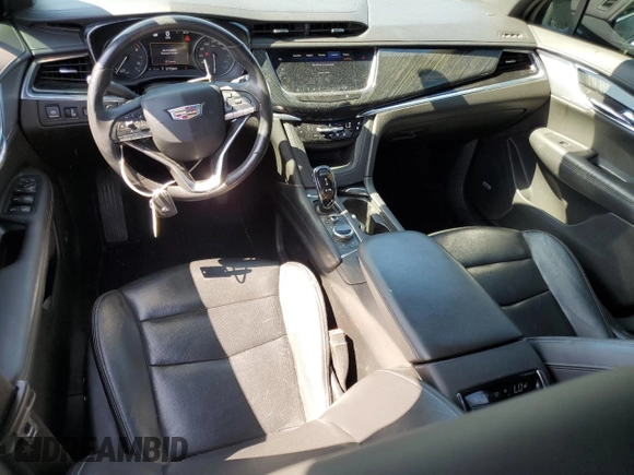 2020 Cadillac XT6 FWD Premium Luxury z VIN 1GYKPCRS9LZ126510, wystawiony jako Copart lot #58240585 z przebiegiem 57 156 mil mil oraz Szkoda całkowita • Salvage title. Historia ofert i sprzedaży dostępna na DreamBid. Obrazek 8.