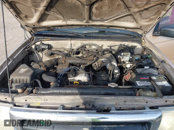 1999 Toyota Tacoma with VIN 4TAPM62NXXZ439318, listed as a IAAI auction lot 41721442 with 299,876 mi miles and . Bid and sale history available at DreamBid. Image 10.