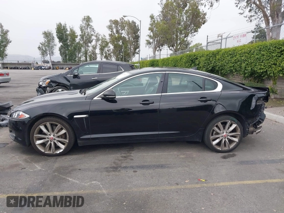 2015 Jaguar XF V6 Portfolio with VIN SAJWA0F77F8U65737, listed as a IAAI auction lot 42078529 with 62,229 mi miles. Bid and sale history available at carsss.com. Image 15.