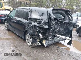 2019 Honda Odyssey EX-L with VIN 5FNRL6H75KB087076, listed as a IAAI auction lot 41796779 with 136,491 mi miles. Bid and sale history available at carsss.com. Image 3.