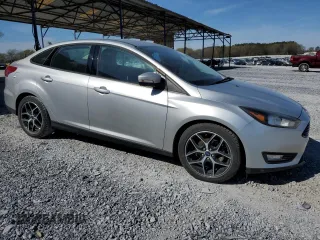 2017 Ford Focus SE with VIN 1FADP3FE0HL336863, listed as a Copart auction lot 50493435 with 64,451 mi miles and Clean Title. Bid and sale history available at DreamBid. Image 4.