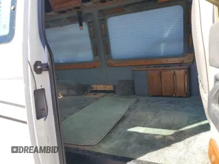 2000 Ford Econoline Cargo with VIN 1FDRE14W8YHC03112, listed as a Copart auction lot 43219225 with 177,781 mi miles and Salvage Title. Bid and sale history available at carsss.com. Image 11.