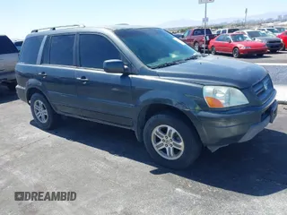 2004 Honda Pilot EX with VIN 2HKYF18514H623272, listed as a IAAI auction lot 42020669 with 186,766 mi miles and . Bid and sale history available at DreamBid. Image 1.