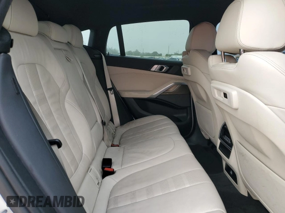 2021 BMW X6 sDrive40i z VIN 5UXCY4C08M9F34312, wystawiony jako Copart lot #87206474 z przebiegiem 67 851 mil mil oraz Czysty tytuł • Clean title. Historia ofert i sprzedaży dostępna na DreamBid. Obrazek 11.