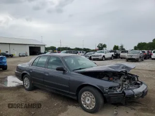 2004 Ford Police Interceptor Base w/3.27 Axle с VIN 2FAFP71W44X176581, выставлен на аукционе Copart как лот 58035125 с пробегом 166 615 миль миль и Списание • Salvage title. История ставок и продаж доступна на DreamBid. Изображение 4.