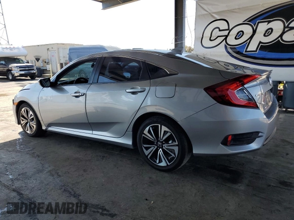 2016 Honda Civic EX-T with VIN 19XFC1F38GE222215, listed as a Copart auction lot 58805855 with 132,849 mi miles and Salvage title. Bid and sale history available at DreamBid. Image 2.