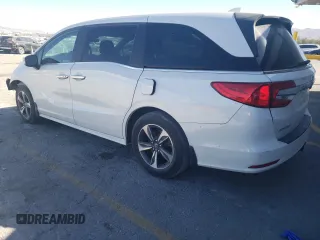2020 Honda Odyssey Touring with VIN 5FNRL6H8XLB007622, listed as a Copart auction lot 76297494 with 83,452 mi miles and Salvage Title. Bid and sale history available at DreamBid. Image 2.