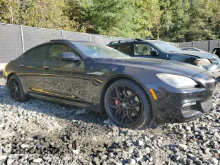 2014 BMW 6 Series 650i xDrive z VIN WBA6B4C54ED371520, wystawiony jako Copart lot #75107784 z przebiegiem 136 077 mil mil oraz Szkoda całkowita • Salvage title. Historia ofert i sprzedaży dostępna na DreamBid. Obrazek 4.