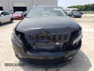 2019 Jeep Cherokee z VIN 1C4PJLJN0KD215834, wystawiony jako Copart lot #57652975 z przebiegiem 127 986 mil mil oraz Czysty tytuł • Clean title. Historia ofert i sprzedaży dostępna na DreamBid. Obrazek 5.