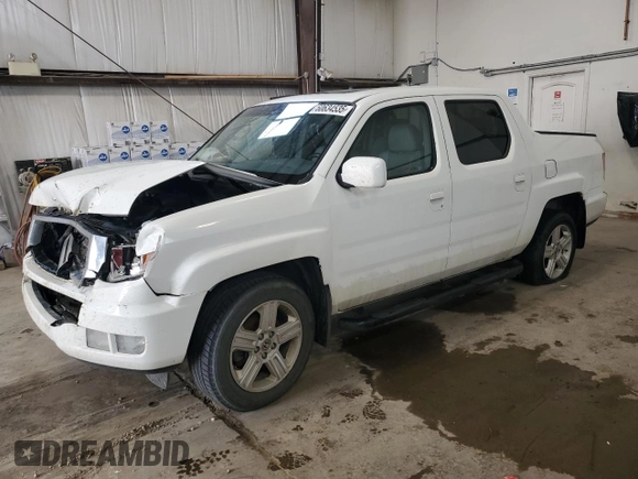 2012 Honda Ridgeline RTL with VIN 5FPYK1F59CB501178, listed as a Copart auction lot 60634535 with 165,766 mi miles and Salvage title. Bid and sale history available at DreamBid. Image 1.
