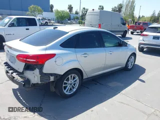 2016 Ford Focus SE with VIN 1FADP3F27GL322186, listed as a IAAI auction lot 42062320 with 131,007 mi miles and . Bid and sale history available at carsss.com. Image 4.