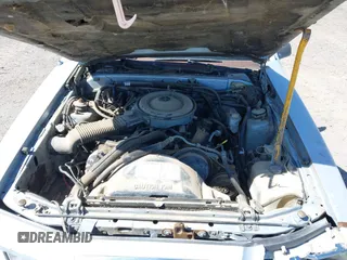 1984 Ford Thunderbird z VIN 1FABP4632EH220641, wystawiony jako IAAI lot #42325000 z przebiegiem 6094 mil mil oraz . Historia ofert i sprzedaży dostępna na DreamBid. Obrazek 10.