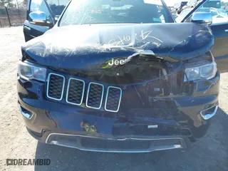 2019 Jeep Grand Cherokee Limited with VIN 1C4RJFBGXKC667340, listed as a IAAI auction lot 41482493 with 69,600 mi miles. Bid and sale history available at carsss.com. Image 6.