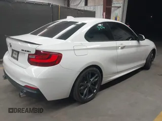 2016 BMW 2 Series M235i with VIN WBA1J7C5XGV359139, listed as a IAAI auction lot 42084849 with 78,574 mi miles. Bid and sale history available at carsss.com. Image 4.