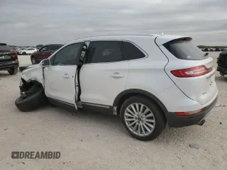 2019 Lincoln MKC Standard with VIN 5LMCJ1D95KUL45392, listed as a Copart auction lot 82561394 with 104,748 mi miles and Salvage Title. Bid and sale history available at DreamBid. Image 2.