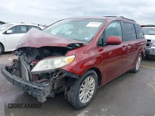 2015 Toyota Sienna XLE with VIN 5TDYK3DC0FS565597, listed as a IAAI auction lot 42062160 with 181,543 mi miles. Bid and sale history available at carsss.com. Image 2.