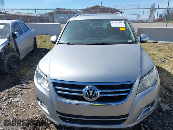 2011 Volkswagen Tiguan SE with VIN WVGBV7AX9BW509353, listed as a IAAI auction lot 41645315 with 112,283 mi miles and . Bid and sale history available at DreamBid. Image 6.