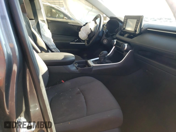 2019 Toyota RAV4 LE with VIN JTMH1RFV7KD016442, listed as a Copart auction lot 87880635 with 136,803 mi miles and Salvage Title. Bid and sale history available at carsss.com. Image 7.